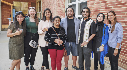 Image of a group of students outside in the Perloff Hall courtyard