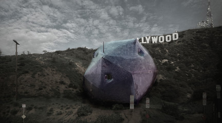 Image of Last House on Mulholland, a space-ship looking house nestled beneath the Hollywood sign.  
