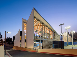 Image of the exterior of the UCLA Basketball Practice Facility, with a roof that is cut into an undulating pattern.