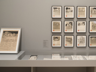 Image of a collection of images in frames on the wall for Frank Lloyd Wright at 150, an exhibition at MOMA in New York