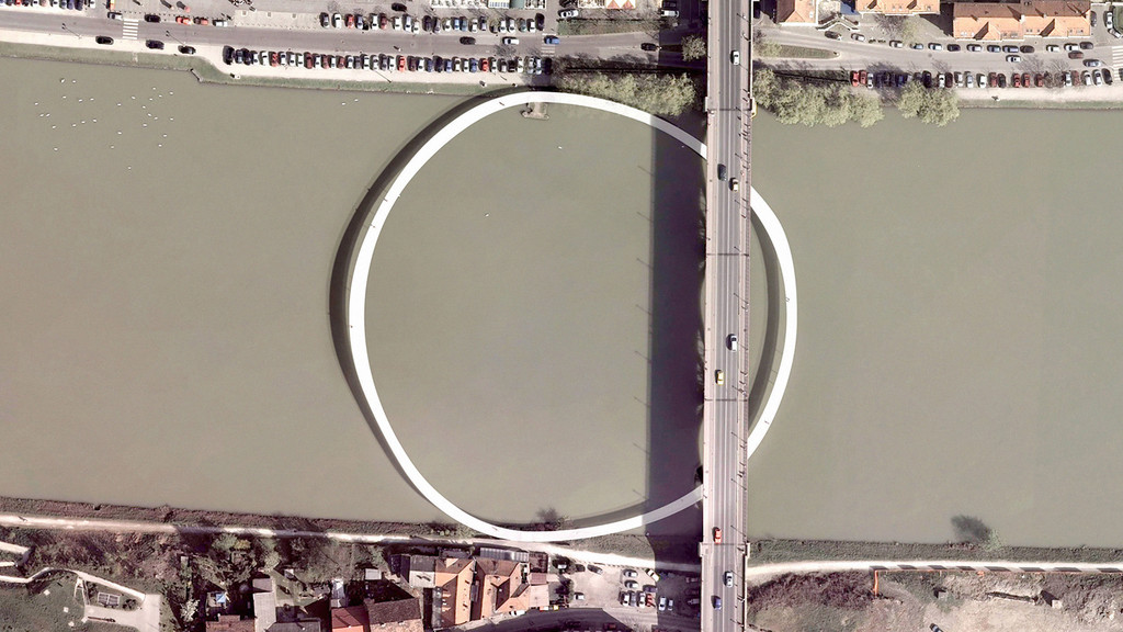 Aerial shot of a circular bridge in Maribor, Slovenia
