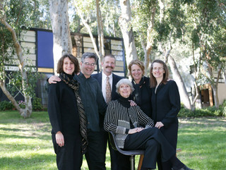 Lucia Eames and her five children shortly after she created the Eames Foundation to take care of the House