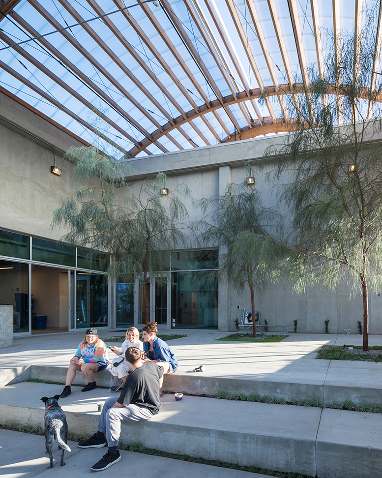 Students sitting in the new UCLA Margo Leavin Graduate Art Studios: