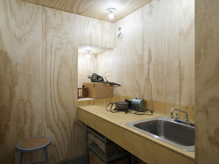 Photo of bathroom with wooden walls