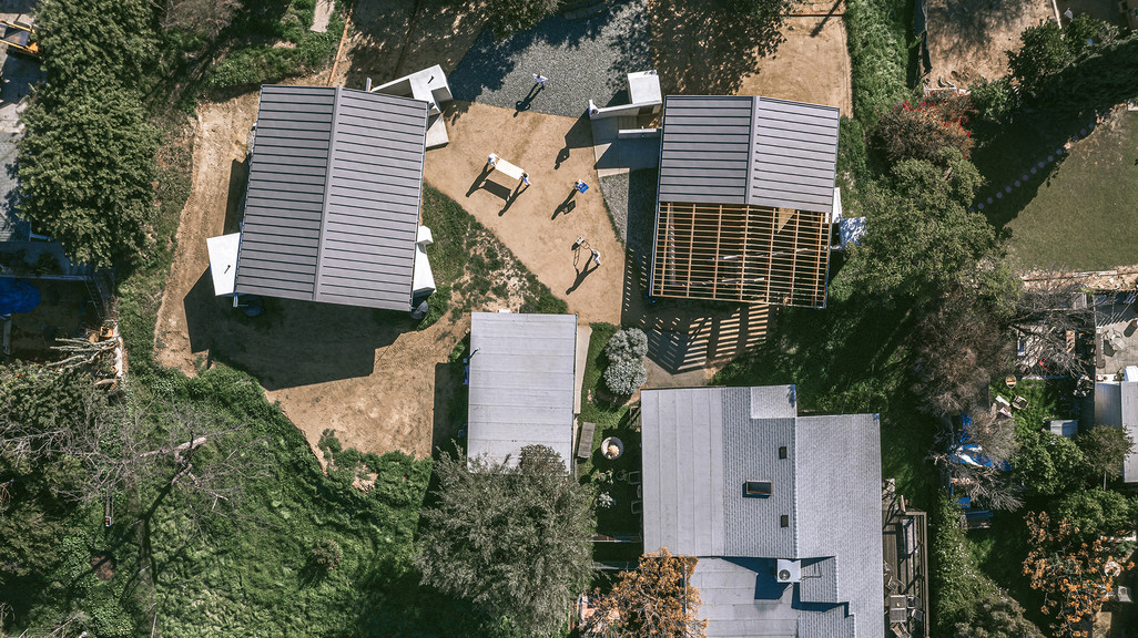 Aerial photograph of completed building - an art studio and residential compound
