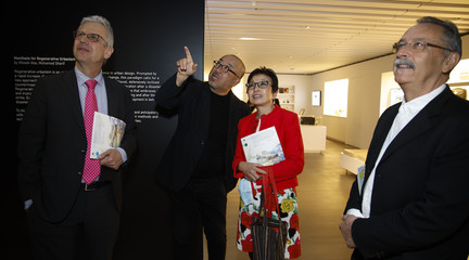 Professor Abe (second from left) discussing the exhibition with architect Andrew Zago; Cindy Fan, UCLA Vice Provost for Global Affairs; and Donald Bates, Chair of Architectural Design and Associate Dean, Melbourne School of Design