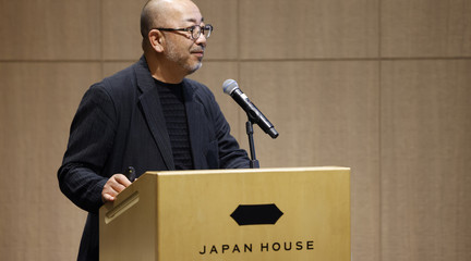 Professor Abe offers remarks during the opening reception for "Living with Disaster"